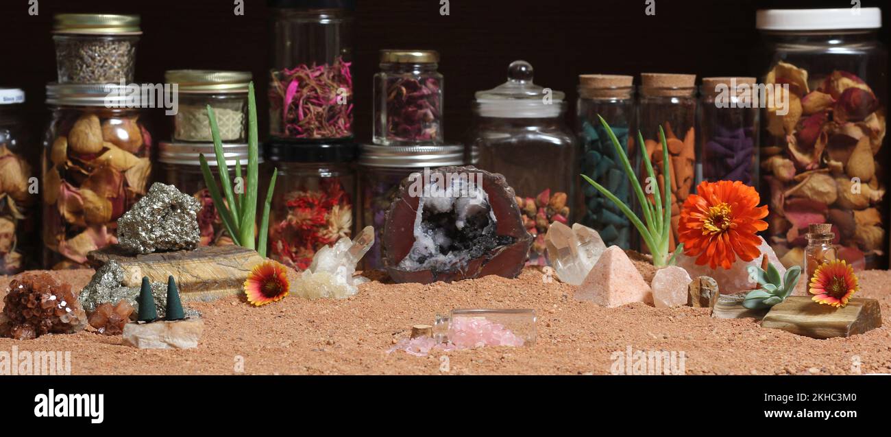 Chakra Stones With Aloe Vera Plants and Incense Cones on Australian Red Sand Stock Photo
