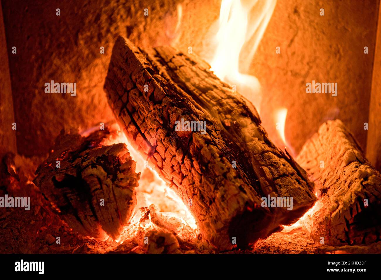 Burning log in the fireplace, firewood, open fire, fireplace, glowing