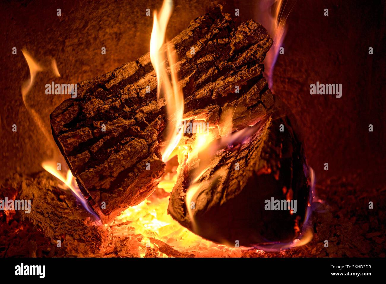 Burning log in the fireplace, firewood, open fire, fireplace, glowing