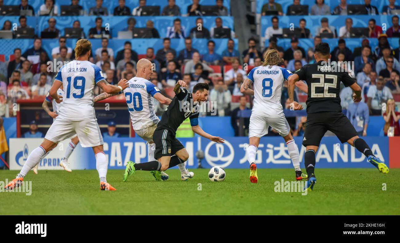 Moscow, Russia - June 16, 2018. Iceland national football team midfielder Emil Hallfredsson committing a foul on Argentina captain Lionel Messi during Stock Photo