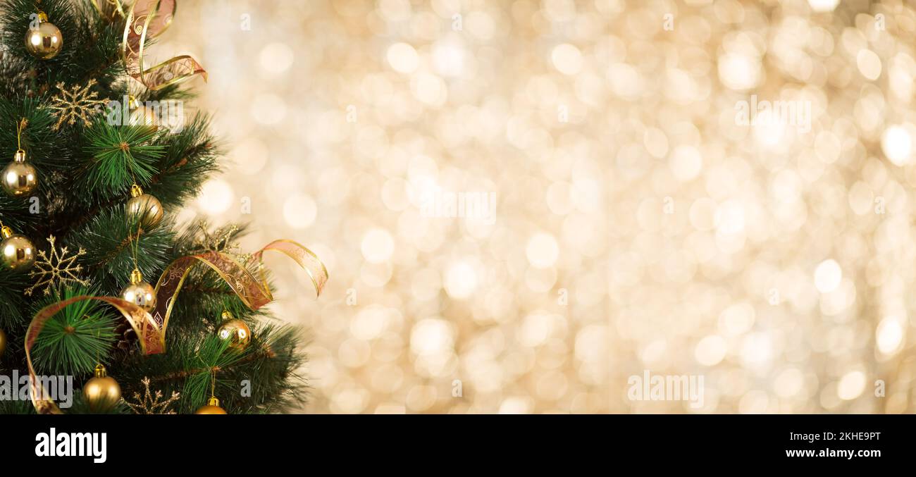 Gold Christmas decorated tree background Stock Photo