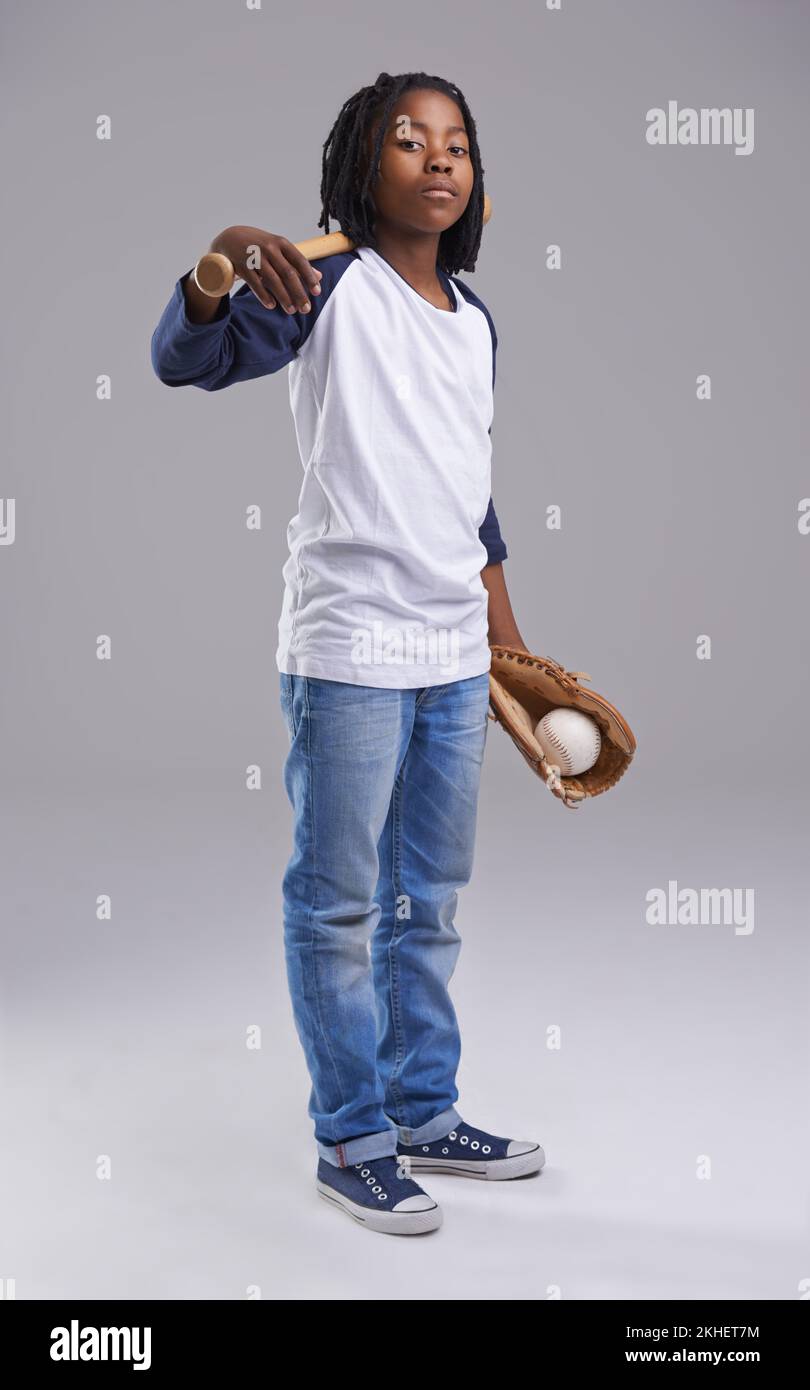 Hes the best on the team. Studio shot of a young boy with baseball gear. Stock Photo