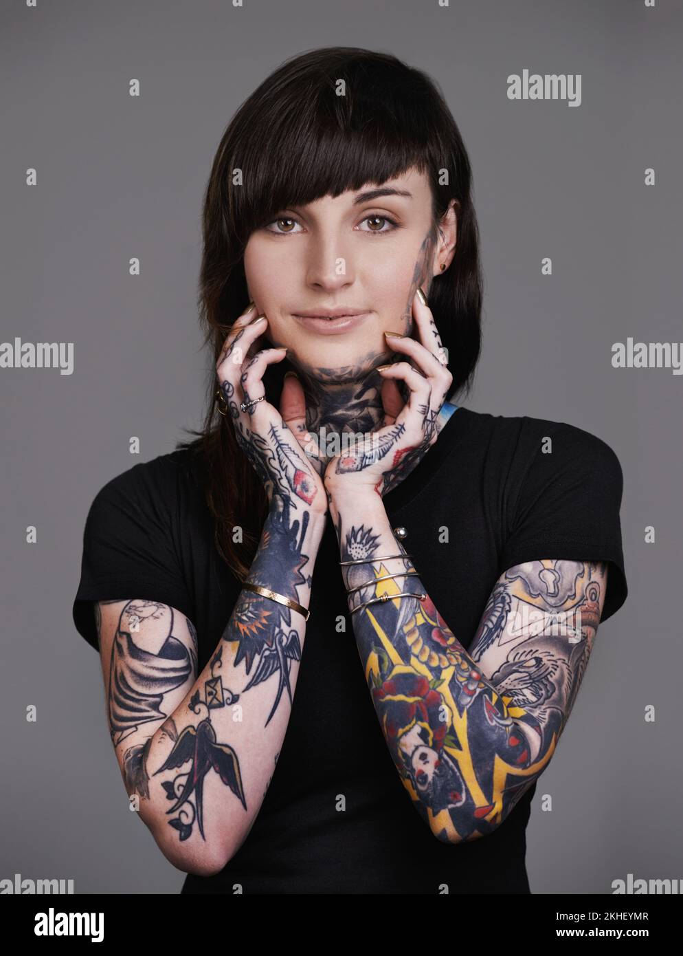Let your inner self become the outer you. A cropped studio portrait of a beautiful tattooed young woman. Stock Photo