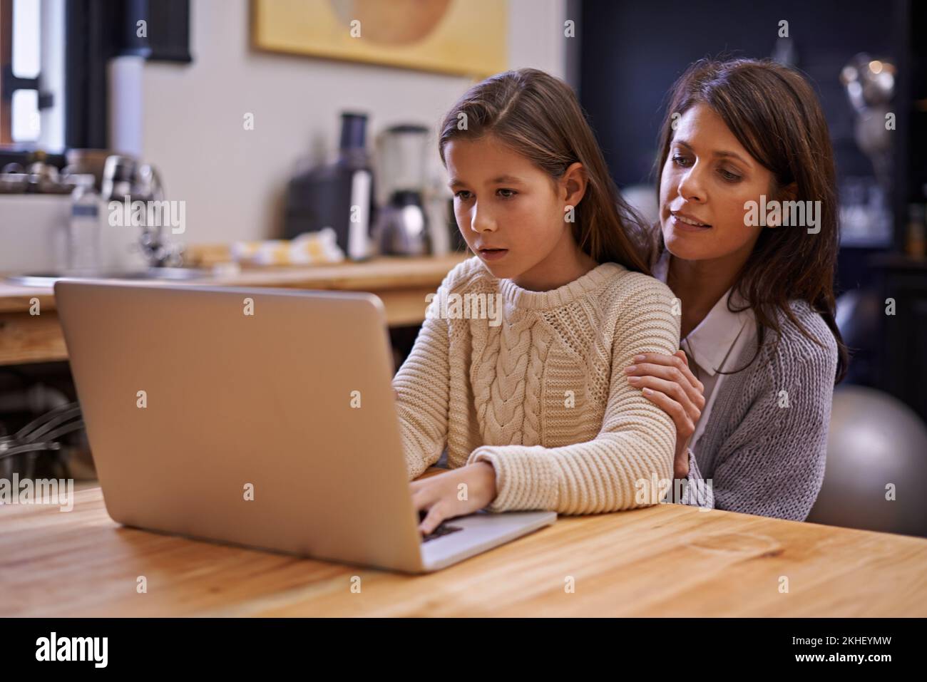 Showing her the basics of the a young girl studying with her