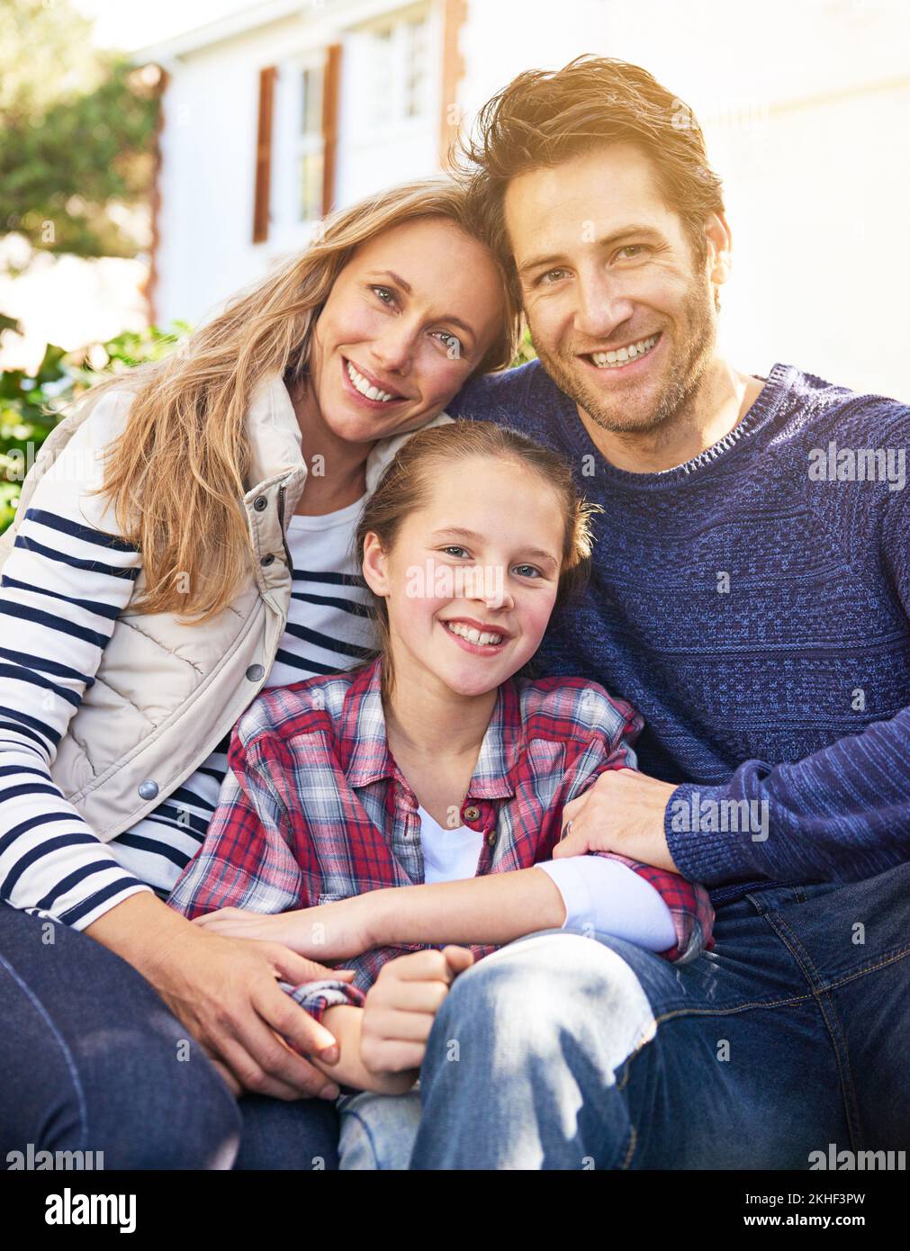 Together we make a family. Portrait of a family of three spending time together. Stock Photo