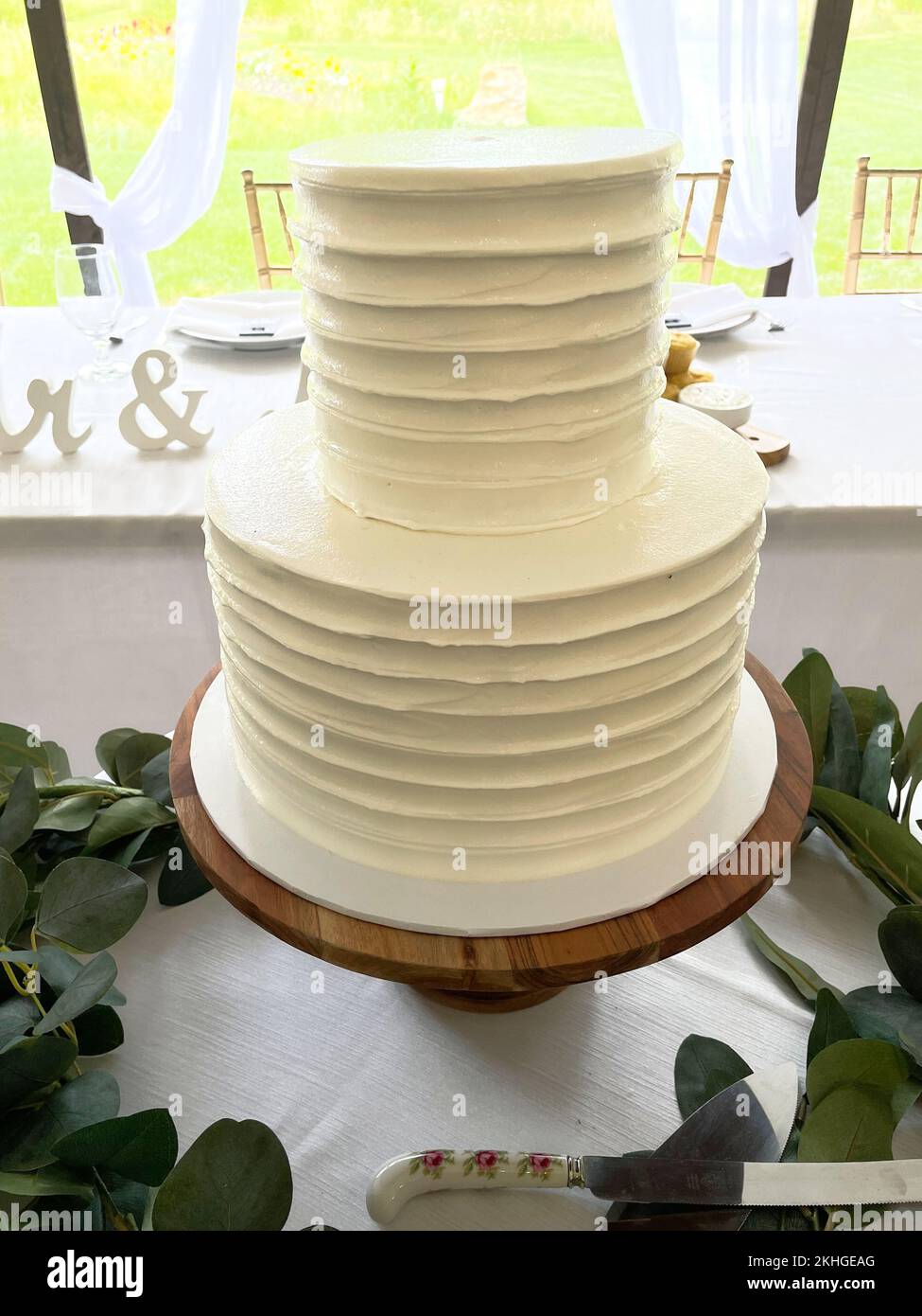 A wedding cake with white icing Stock Photo