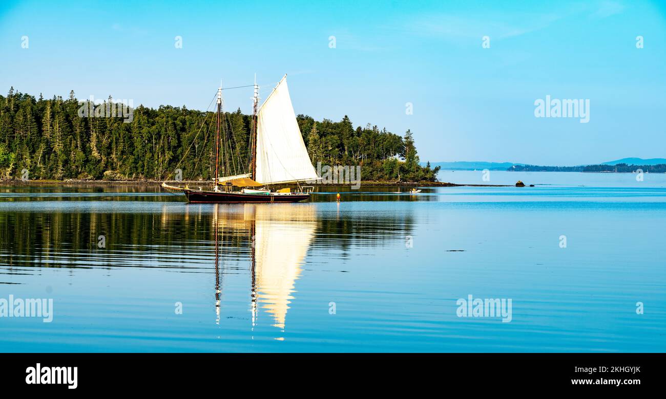 A beautiful view of a visiting schooner in NW Harbor under the clear sky Stock Photo