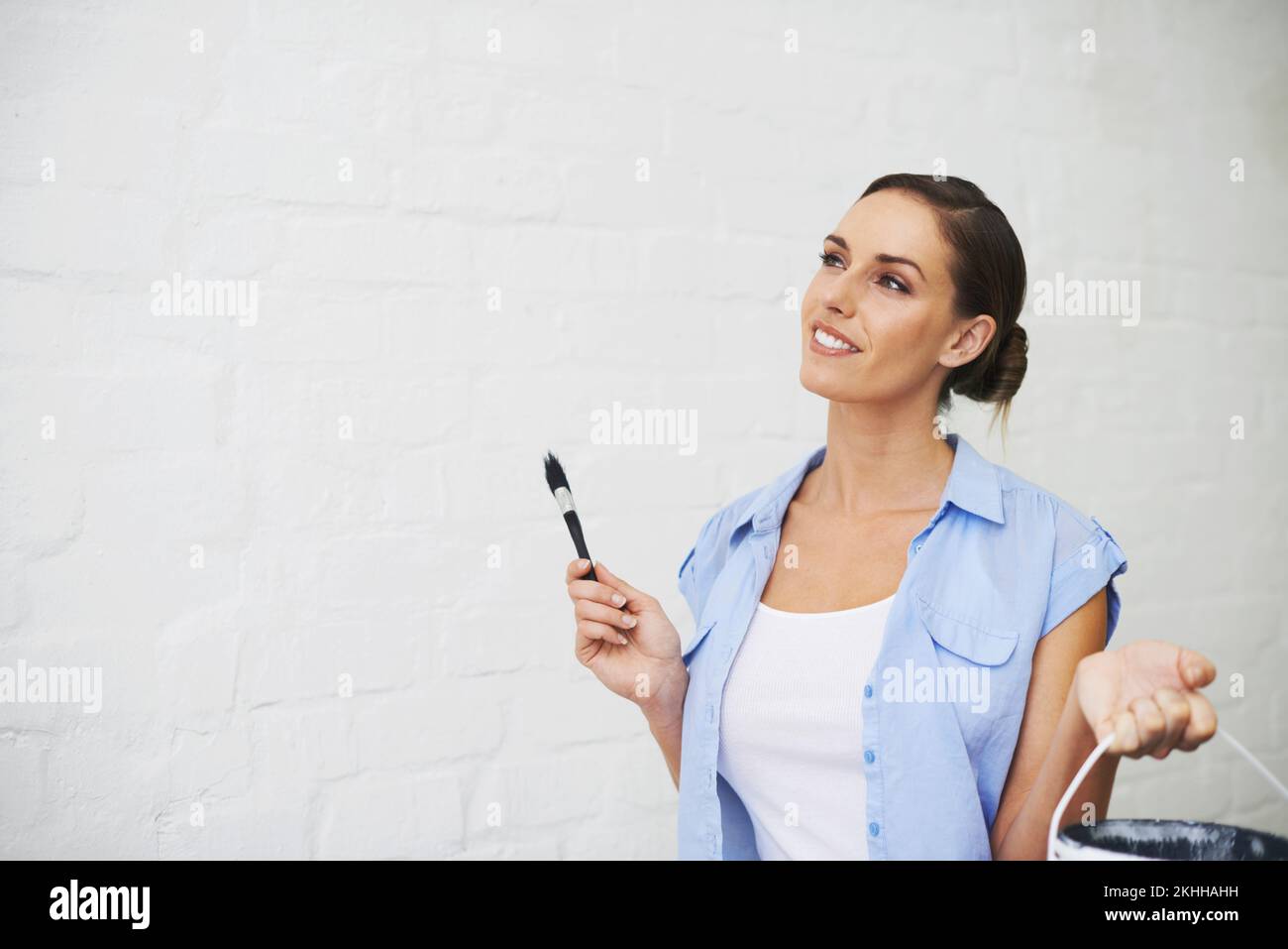Holding paint brush hi-res stock photography and images - Alamy