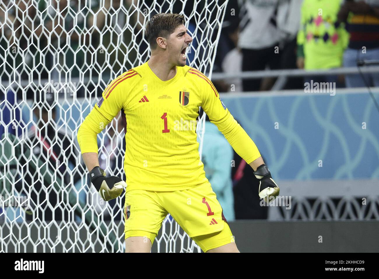Belgium goalkeeper Thibaut Courtois celebrates after blocking Alphonso