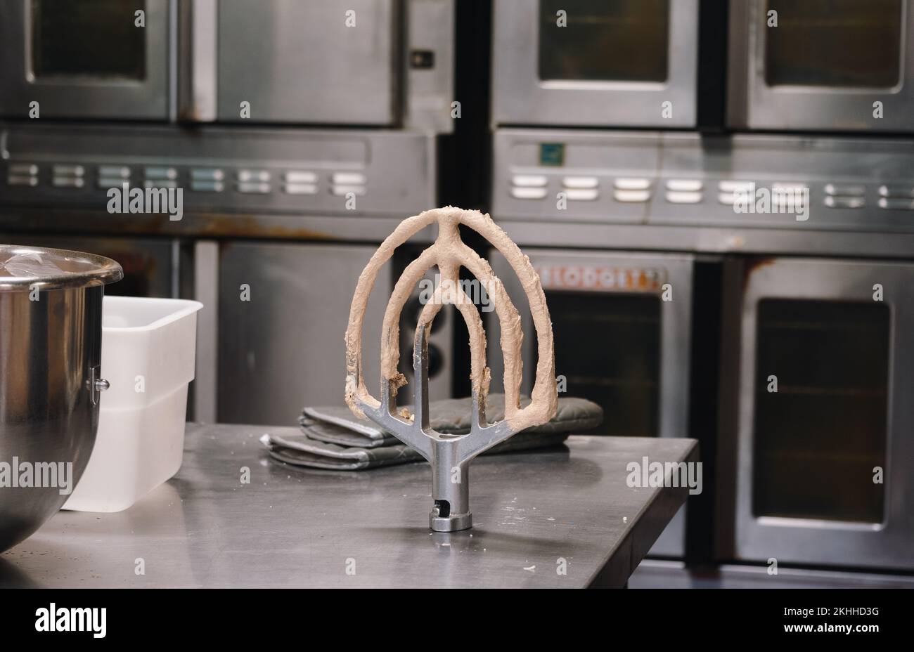 Bread Mixer In Bakery, mixing dough for baguettes in a bakery machine for  mixing dough Stock Photo - Alamy