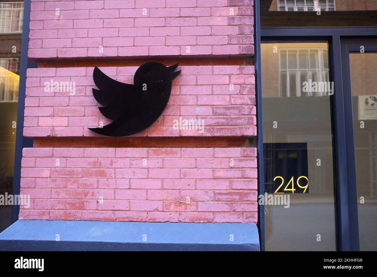 Twitter logo outside the company's corporate office in New York City ...