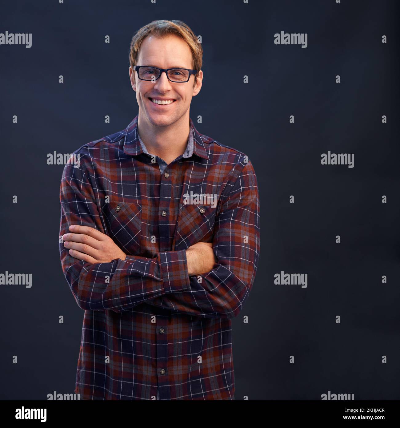 As smart as he is handsome. A studio portrait of a handsome man wearing glasses. Stock Photo