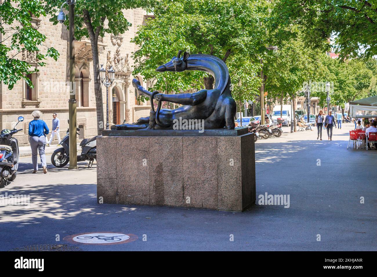 BARSELONA, SPAIN - MAY 12, 2017: Sculpture Resting Giraffe is a figure of a giraffe lying in a resting flirtatious pose on the boulevard in the center Stock Photo