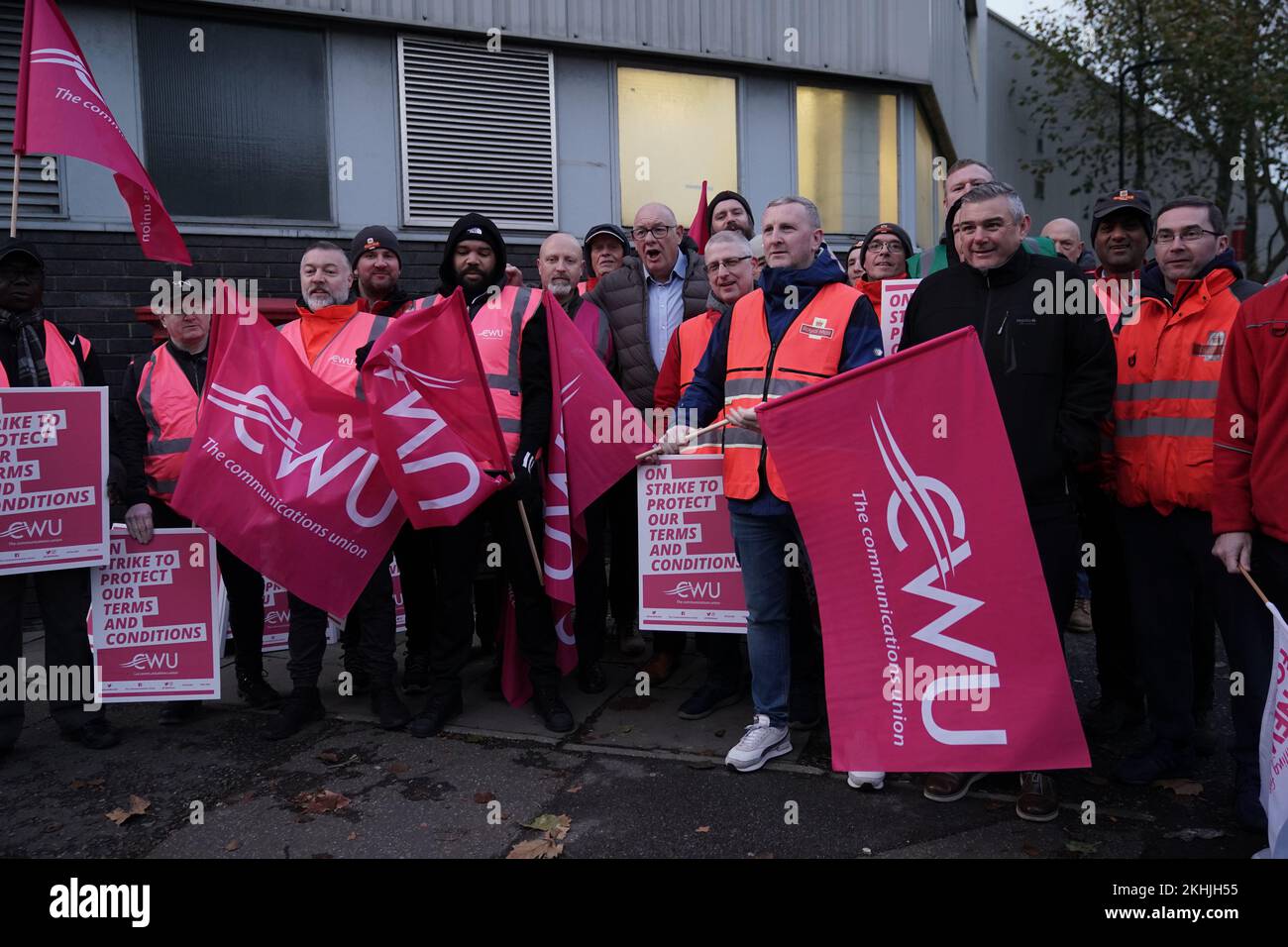 Communication Workers Union (CWU) general secretary Dave Ward (centre) joins postal workers on the picket line at the Camden Town Delivery Office in north west London. Members of the Communication Workers Union (CWU) are holding a 48-hour strike in a long-running dispute over jobs, pay and conditions. Picture date: Thursday November 24, 2022. Stock Photo