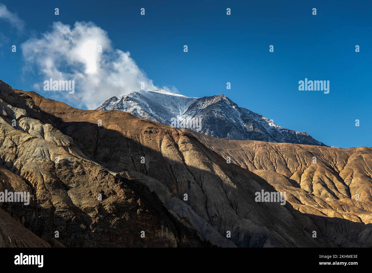 A landscape of Snow mountain in Luozha County, Shannan City, Tibet, China with blue sky Stock Photo