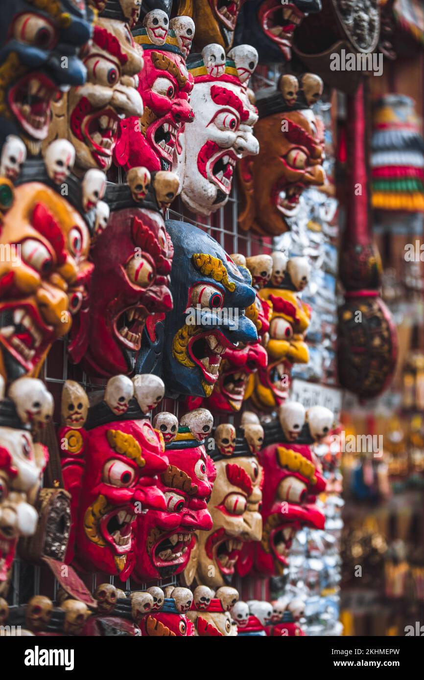 A closeup of hanging Buddhist masks Stock Photo
