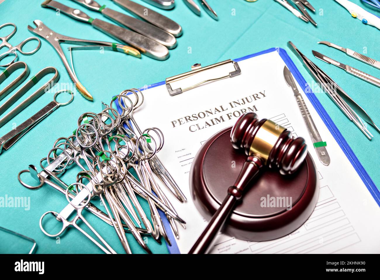 Health and Law. Medical malpractice, personal injury lawyer. Judge gavel and Operating Desk, top view. Stock Photo