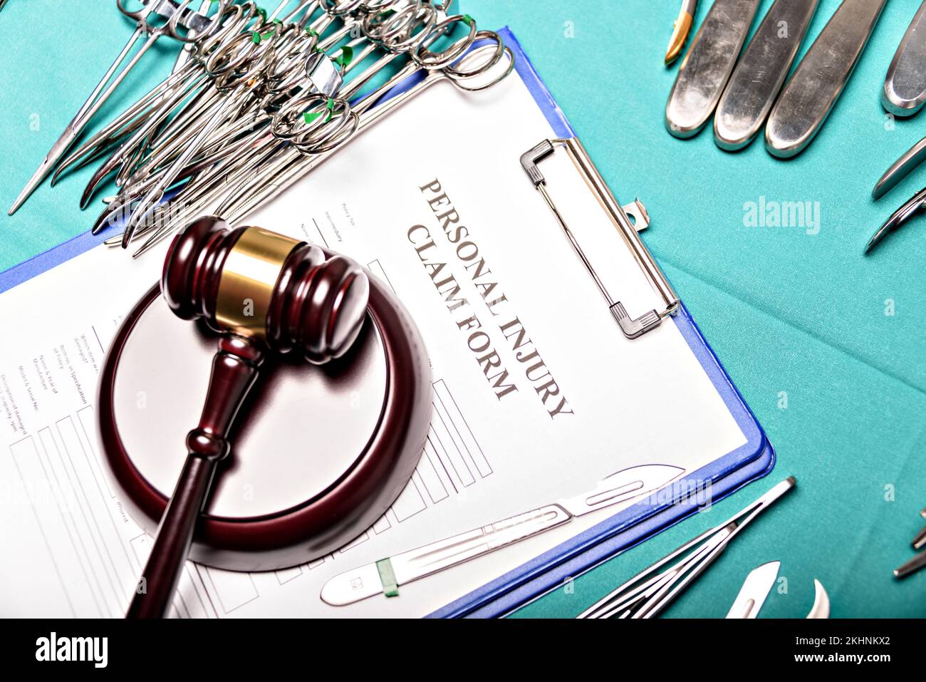 Health and Law. Medical malpractice, personal injury lawyer. Judge gavel and Operating Desk, top view. Stock Photo