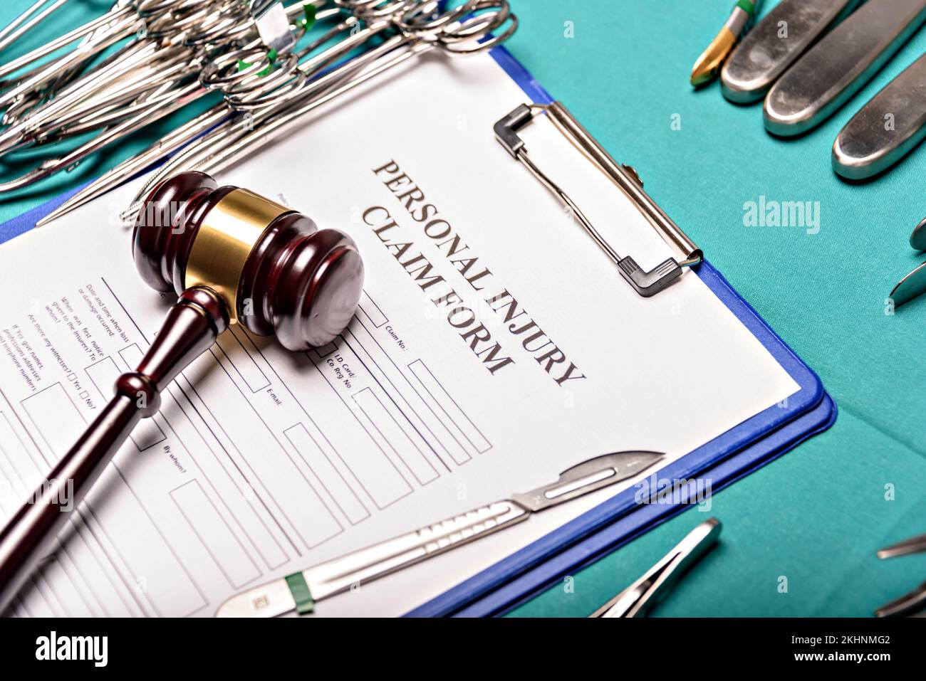 Health and Law. Medical malpractice, personal injury lawyer. Judge gavel and Operating Desk, top view. Stock Photo