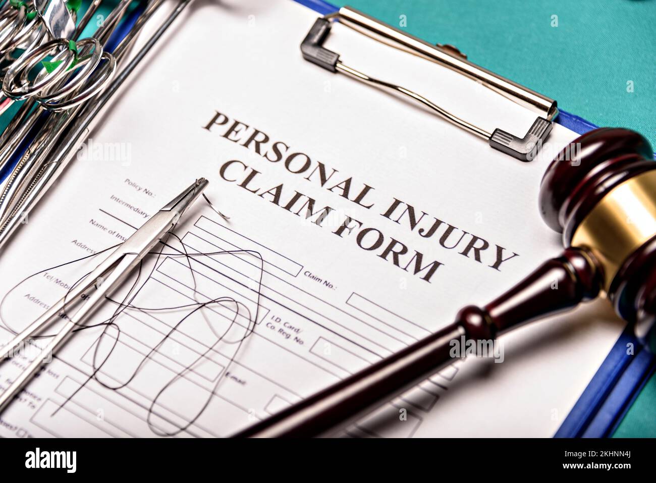 Health and Law. Medical malpractice, personal injury lawyer. Judge gavel and Operating Desk, top view. Stock Photo