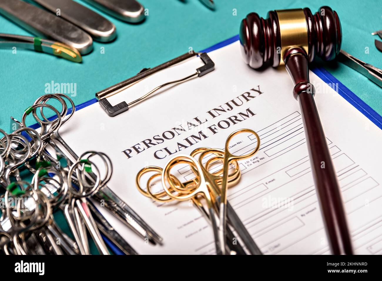 Health and Law. Medical malpractice, personal injury lawyer. Judge gavel and Operating Desk, top view. Stock Photo