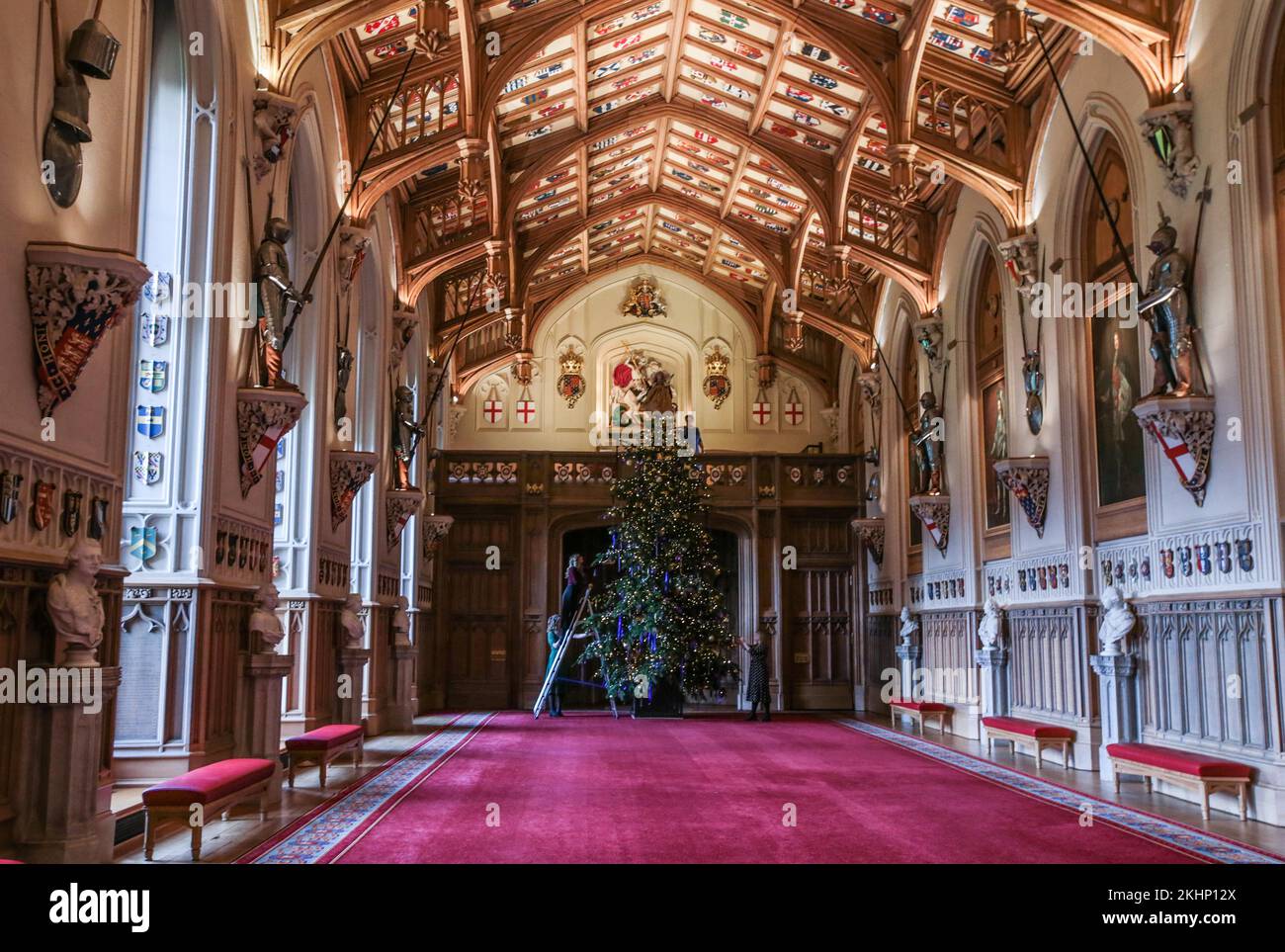 Windsor, Berkshire, UK  24 November 2022  Windsor Castle unveiled the Christmas decorations with a 20-foot-high Nordmann Fir tree standing at the end of St George's Hall, felled from nearby Windsor Great Park and dressed with hundreds of iridescent ornaments. Credit: Paul Quezada-Neiman/Alamy Live News Stock Photo