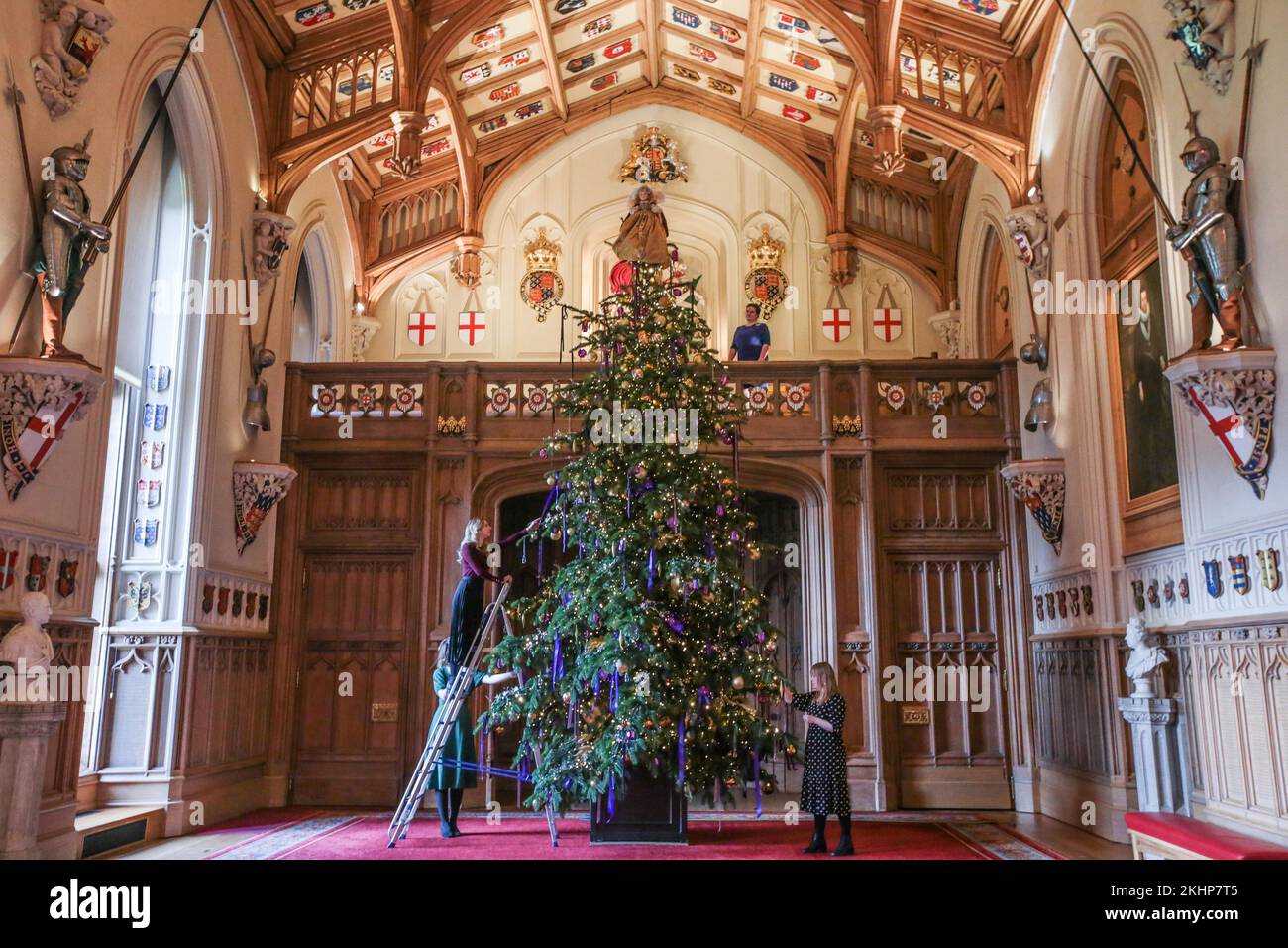 windsor, Berkshire, UK  24 November 2022  Windsor Castle unveiled the Christmas decorations with a 20-foot-high Nordmann Fir tree standing at the end of St George's Hall, felled from nearby Windsor Great Park and dressed with hundreds of iridescent ornaments. Credit: Paul Quezada-Neiman/Alamy Live News Stock Photo
