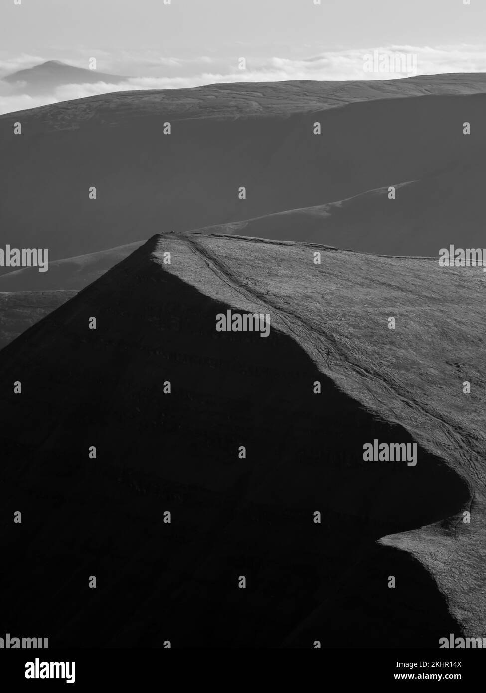 High contrast shot of Cribyn above the clouds (Brecon Beacons) Stock Photo