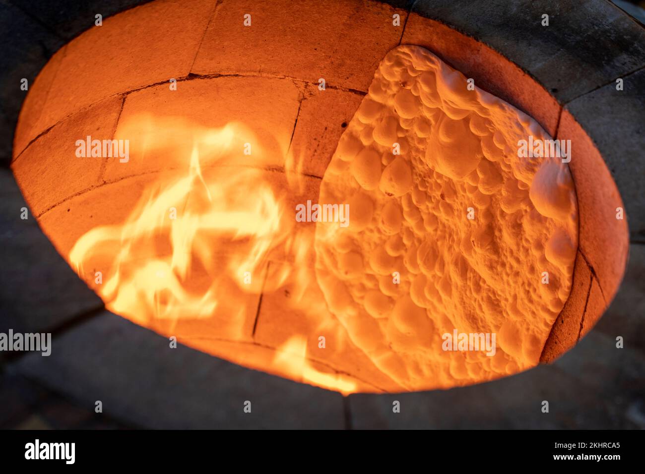 lavash bread cooked in a wood fire in a tandoor. Tandır lavas Stock Photo