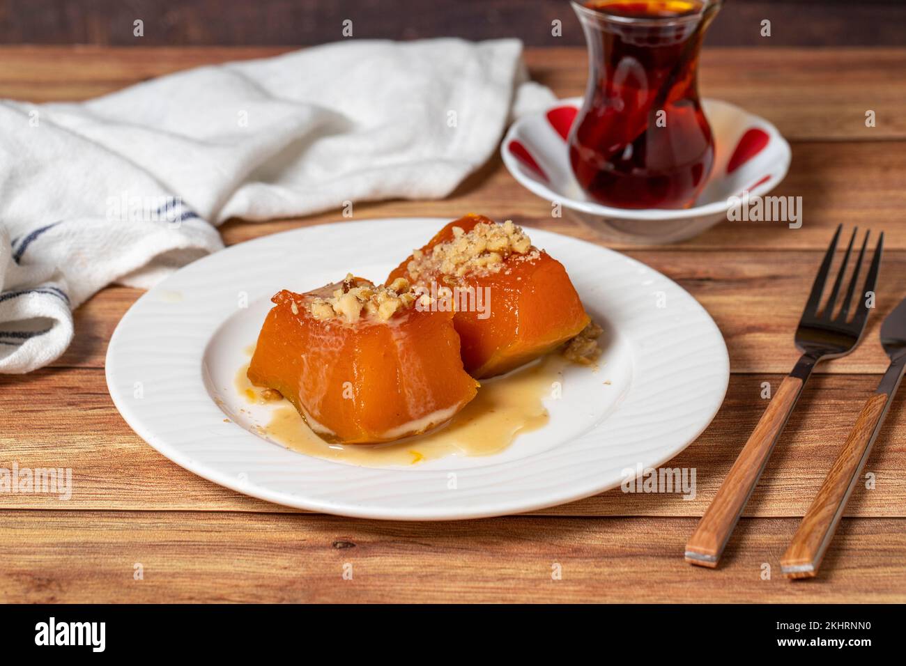 Zucchini dessert with tahini. Traditional Turkish cuisine delicacies. Local name tahinli kabak tatlisi. close up Stock Photo