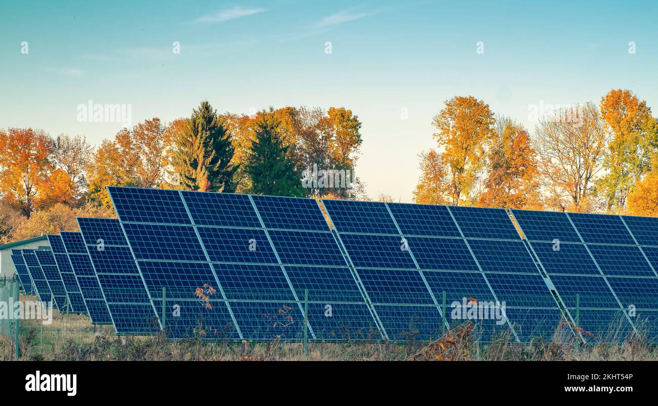 Solar panels installed in nature in the field Ecological energy, environment, Solar panels Stock Photo