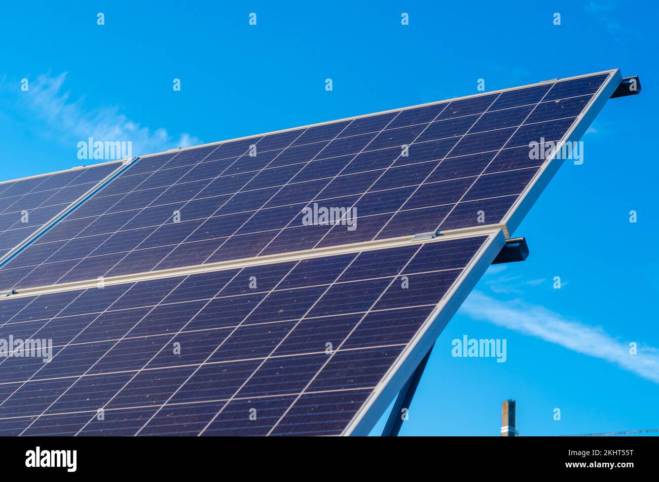 Solar panels installed in nature in the field Ecological energy, environment, Solar panels Stock Photo