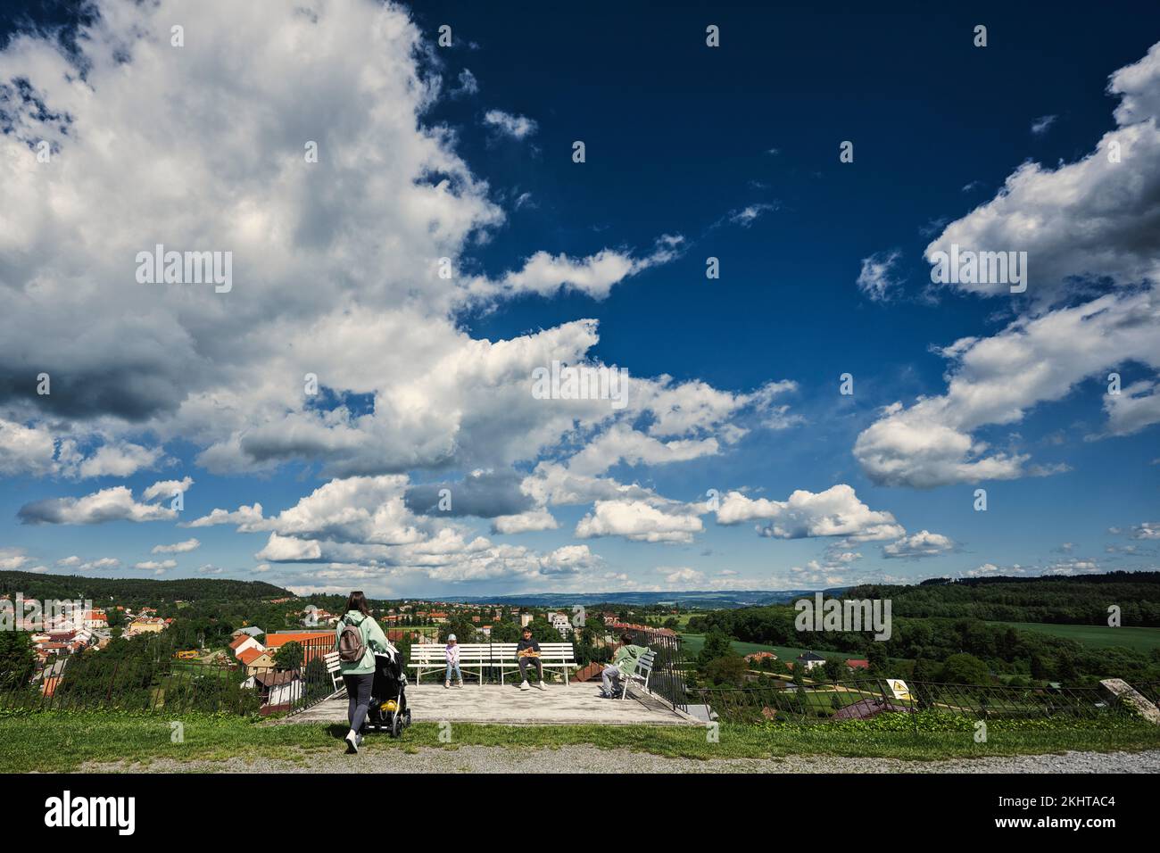 Back of mother with children walking at Chateau Kunstat, Czech Republic. Stock Photo
