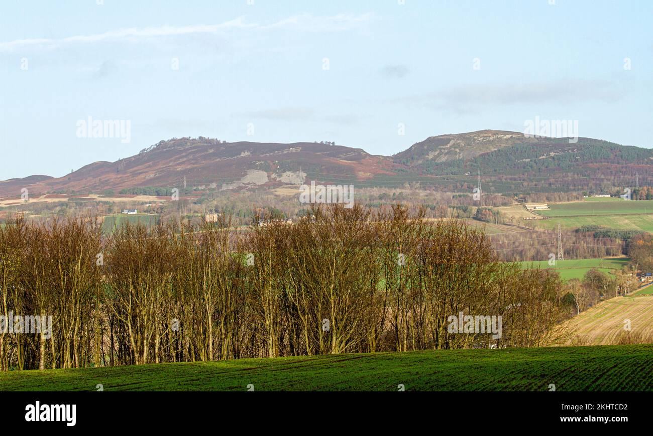 Dundee, Tayside, Scotland, UK. 24th Nov, 2022. UK Weather: Northeast Scotland is enjoying beautiful late November sunshine with highs around 10°C. A breath-taking winter landscape view of rural Dundee's Strathmore Valley and Sidlaw Hills. The Sidlaw Hills in Dundee have quite a diverse plant life, significant antiquities, and a unique role in scientific history as the site of an 18th-century experiment in 'weighing the earth.' Credit: Dundee Photographics/Alamy Live News Stock Photo