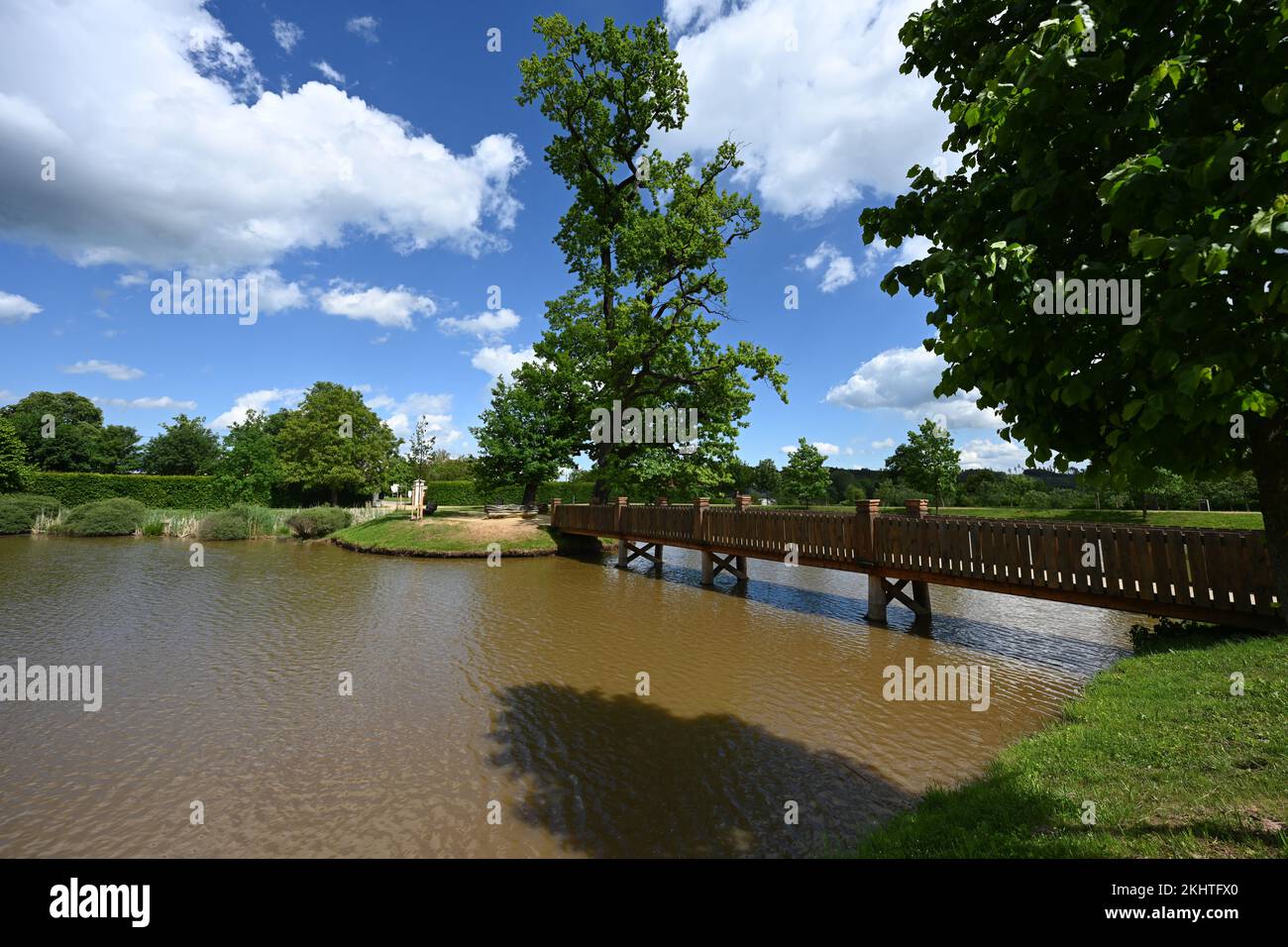 Wooden bridge on pond in Panska Garden,  Kunstat in Moravia, Czech Republic. Stock Photo
