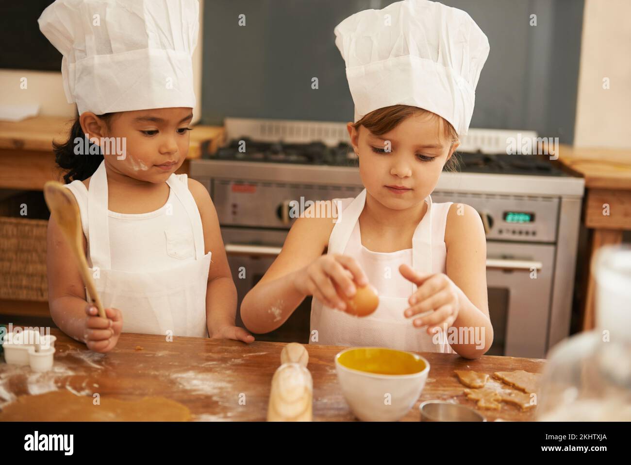 Children bake in kitchen for learning and development of baker skill