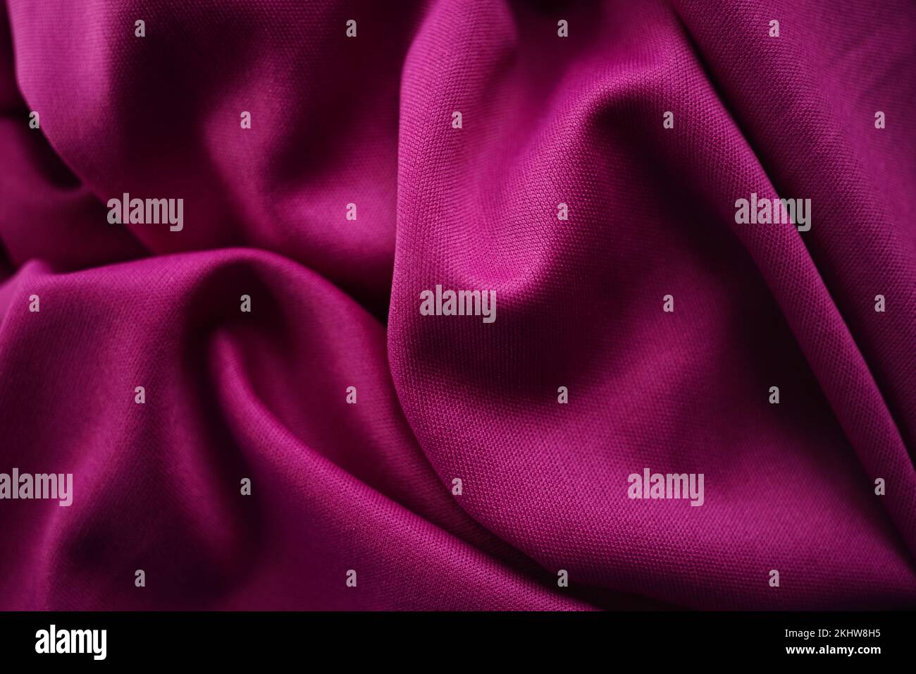 Vivd pink elastic fabric background. Stock Photo