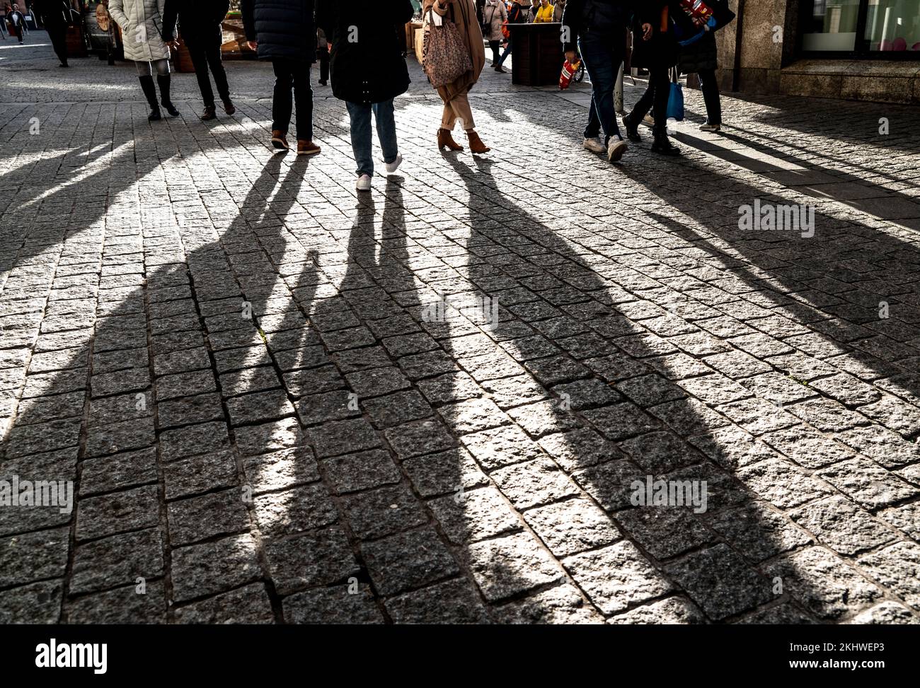 Pedestrians in a pedestrian zone, winter, long shadows, Dortmund, NRW, Germany, Stock Photo