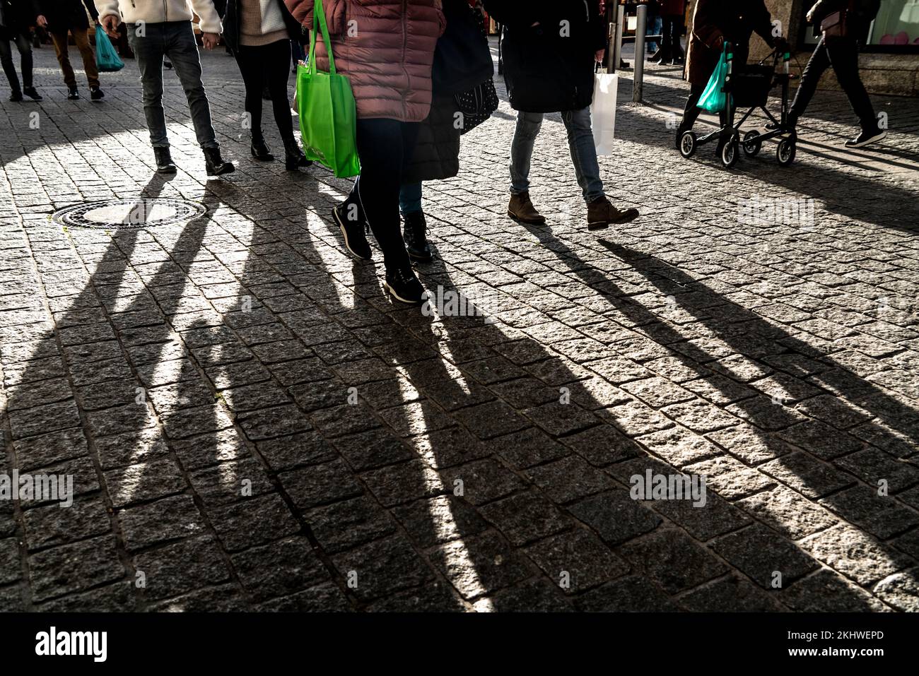 Pedestrians in a pedestrian zone, winter, long shadows, Dortmund, NRW, Germany, Pedestrians in a pedestrian zone, winter, long shadows, Dortmund, NRW, Stock Photo