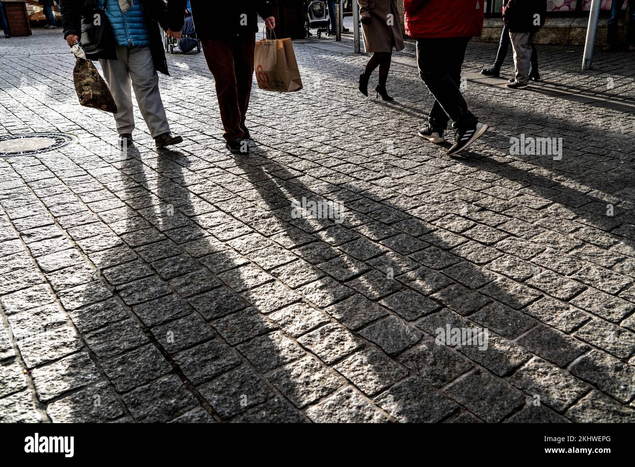 Pedestrians in a pedestrian zone, winter, long shadows, Dortmund, NRW, Germany, Pedestrians in a pedestrian zone, winter, long shadows, Dortmund, NRW, Stock Photo