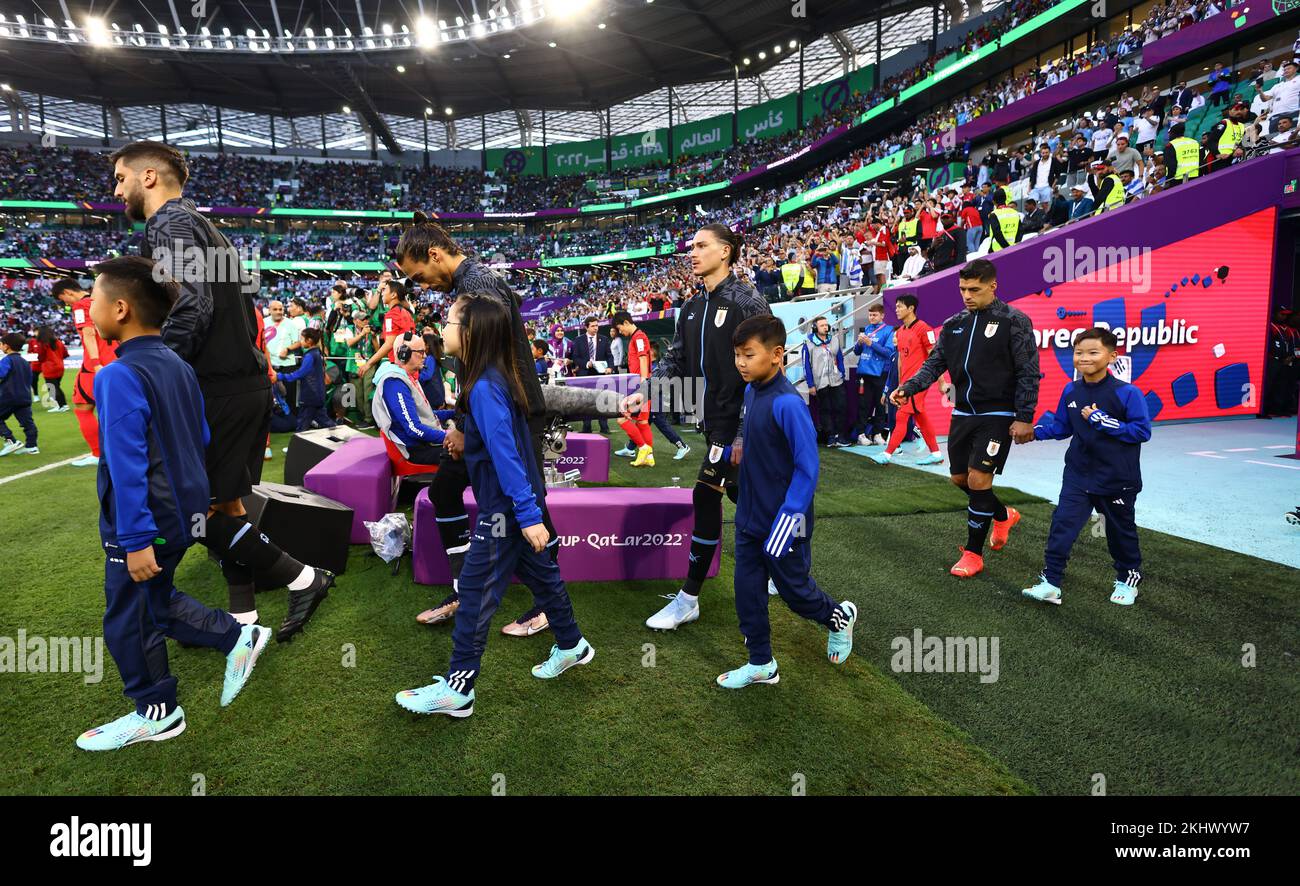 Ar Rayyan, Qatar. 24th Nov, 2022. Darwin Nunez and Luis Suarez of Uruguay make the back of the team as they walk out with their mascots during the FIFA World Cup 2022 match at Education City Stadium, Ar Rayyan. Picture credit should read: David Klein/Sportimage/Alamy Live News/Alamy Live News/Alamy Live News/Alamy Live News Credit: Sportimage/Alamy Live News Stock Photo