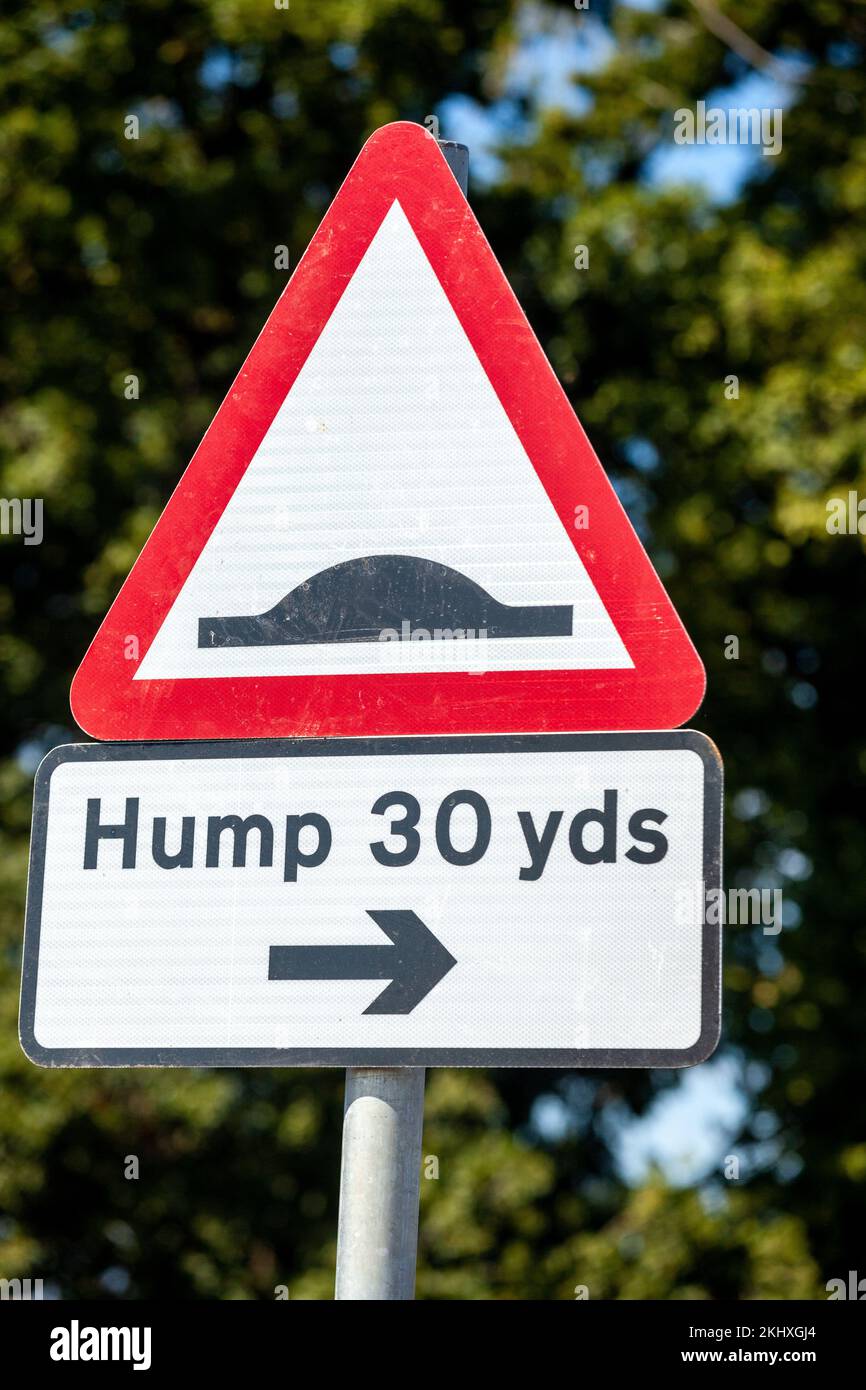 Warning sign of humps for 30 yards Stock Photo