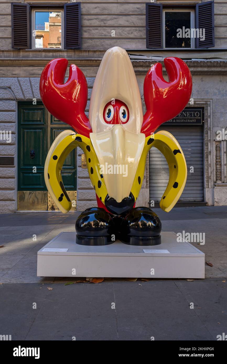 Lobster Banana - Lobster Empire, gigantic sculptures exhibition by British artist Philip Colbert, along Via Vittorio Veneto. Rome, Italy, Europe, EU Stock Photo