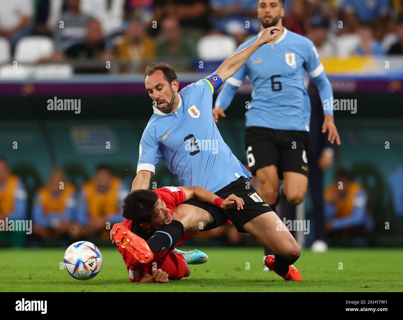 Ar Rayyan, Qatar. 24th Nov, 2022. Sangho Na of Korea challenged by Diego Godin of Uruguay during the FIFA World Cup 2022 match at Education City Stadium, Ar Rayyan. Picture credit should read: David Klein/Sportimage Credit: Sportimage/Alamy Live News Stock Photo