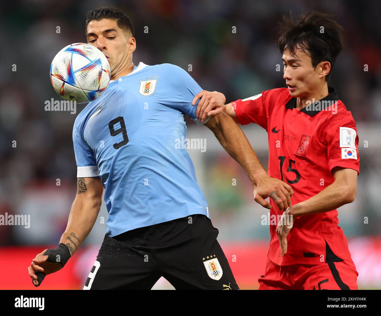 Ar Rayyan, Qatar. 24th Nov, 2022. Luis Suarez of Uruguay tussles with Moonhwan Kim of Korea during the FIFA World Cup 2022 match at Education City Stadium, Ar Rayyan. Picture credit should read: David Klein/Sportimage Credit: Sportimage/Alamy Live News Stock Photo