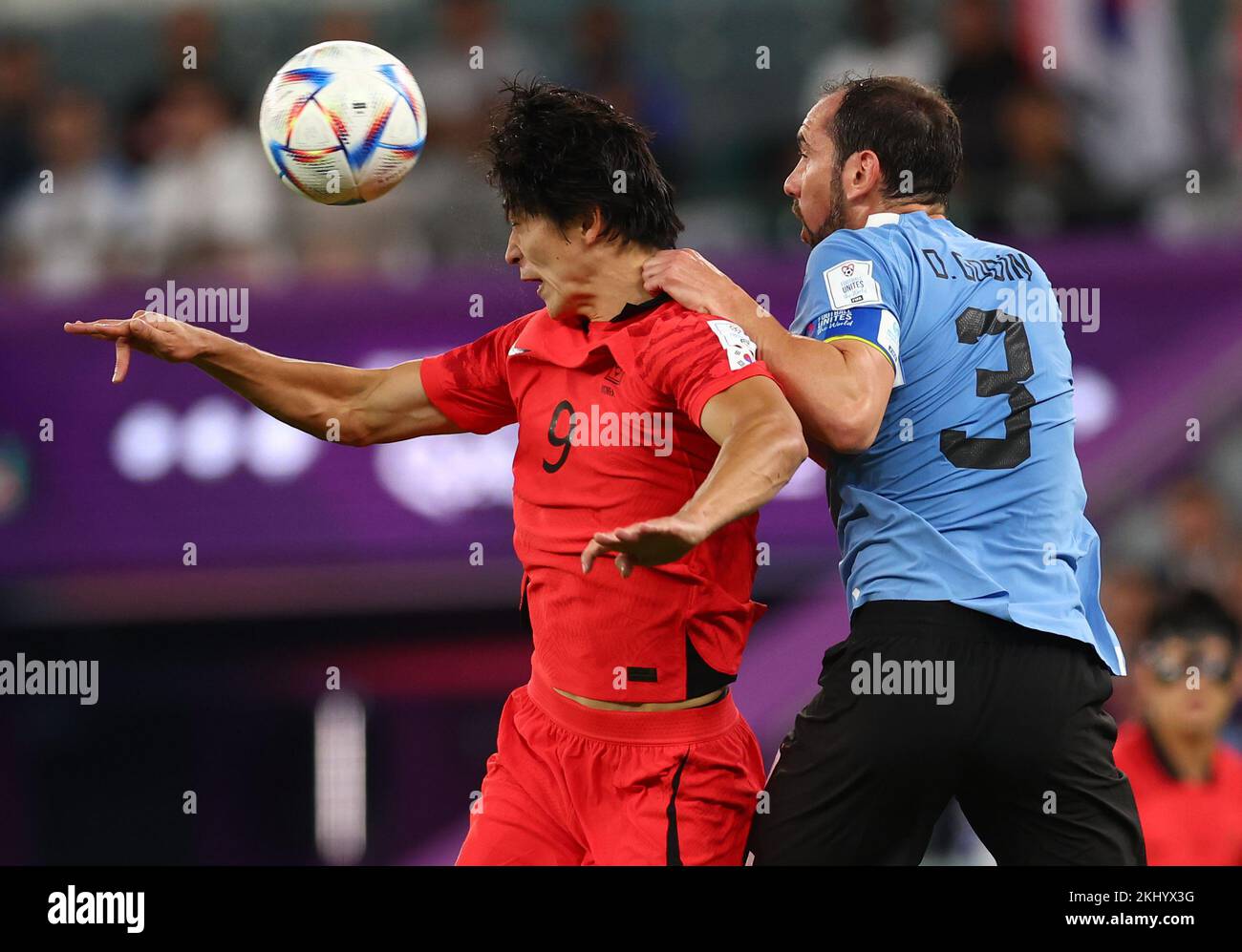 Ar Rayyan, Qatar. 24th Nov, 2022. Guesung Cho of Korea challenged by Diego Godin of Uruguay during the FIFA World Cup 2022 match at Education City Stadium, Ar Rayyan. Picture credit should read: David Klein/Sportimage Credit: Sportimage/Alamy Live News Stock Photo