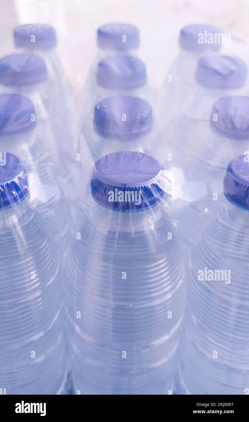Pack of small shrinkwrapped water bottles. Plastic water bottle