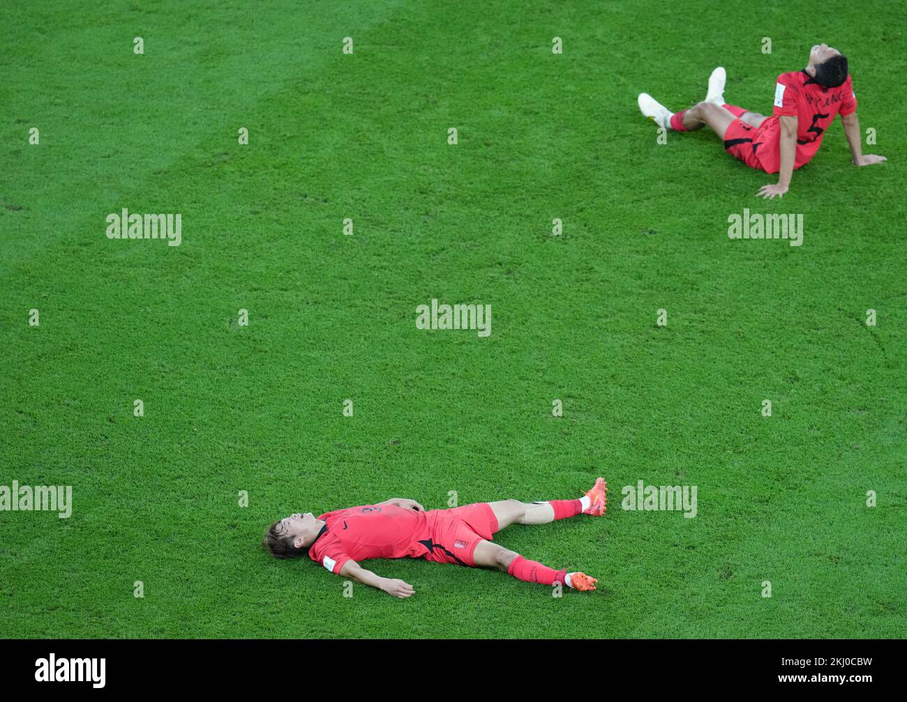 South Korea's Jung Woo-young (top) and Kim Jin-su react after the FIFA World Cup Group H match at the Education City Stadium, Doha, Qatar. Picture date: Thursday November 24, 2022. Stock Photo