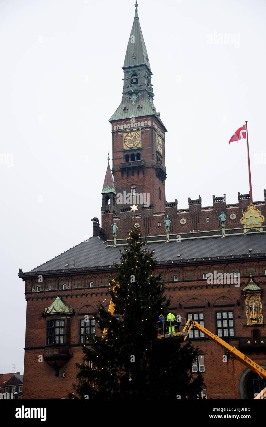 Denmark In November Copenhagen/Denmark/24 November 2022/Persons placing chrstmas electric ...