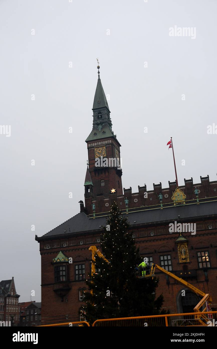 Denmark In November Copenhagen/Denmark/24 November 2022/Persons placing chrstmas electric ...